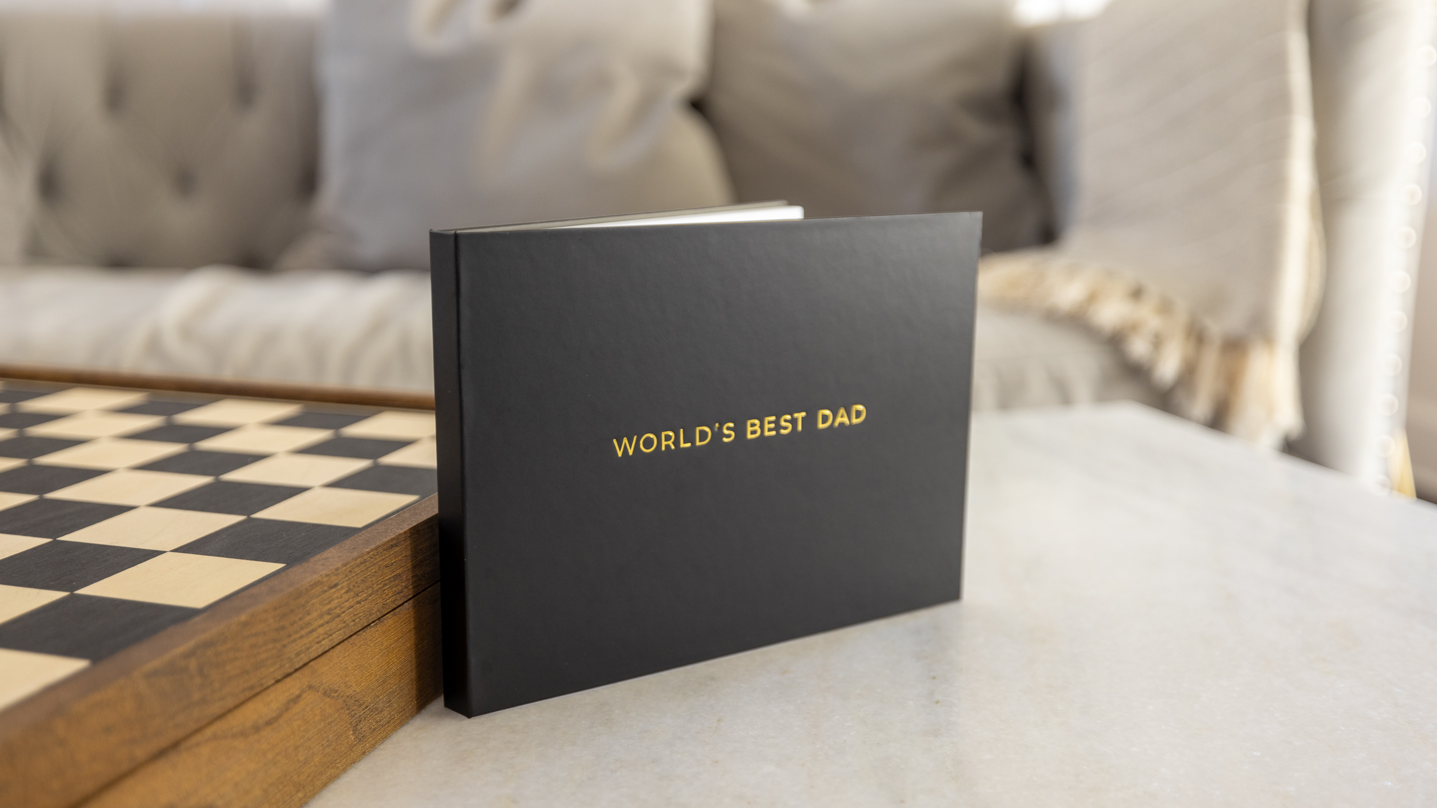 Unique Father's Day card video book from The Motion Books with personalized gold foil cover
